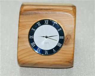 Yew clock by Bernard Slingsby